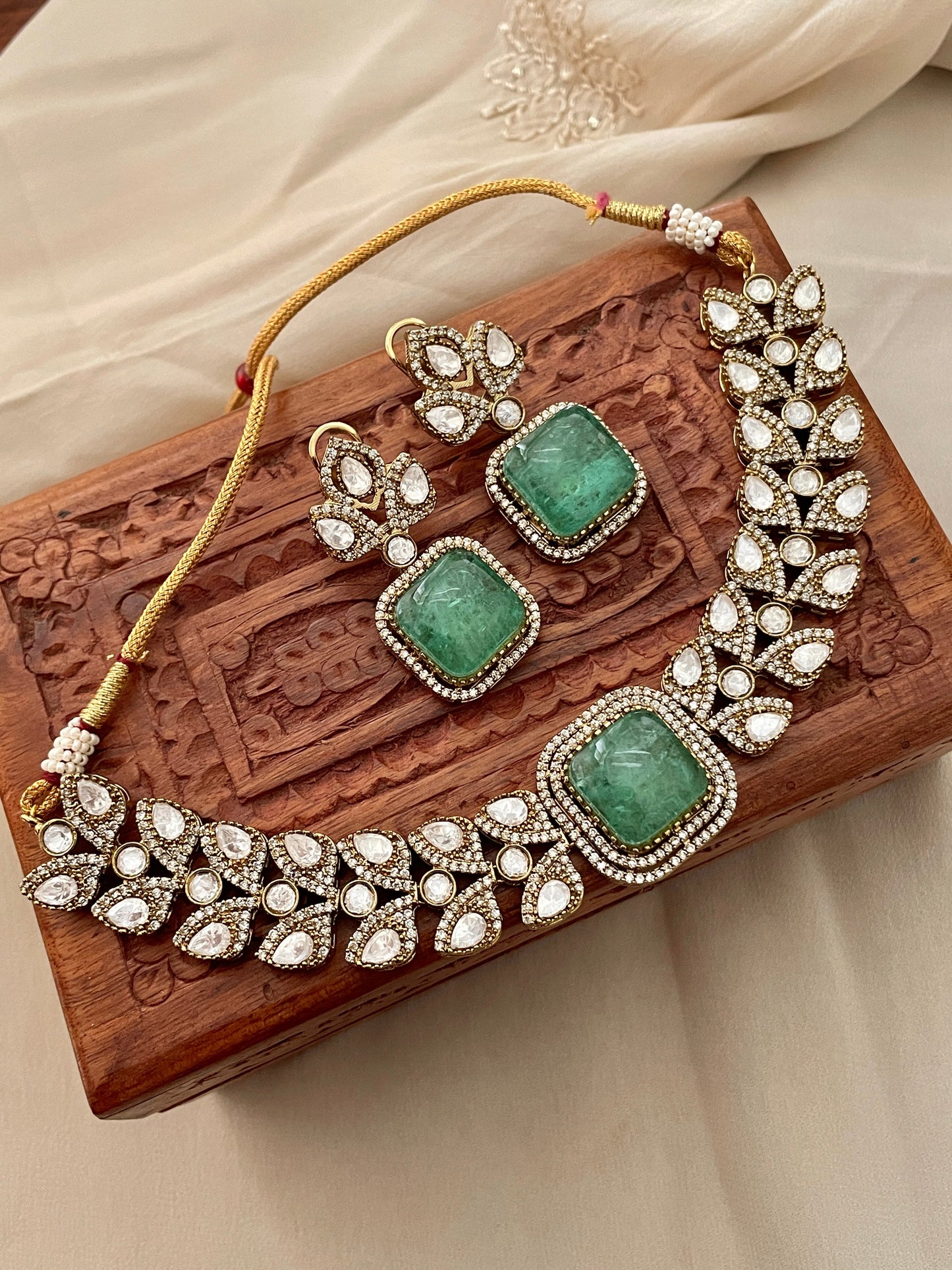 Neelima Moissanite Polki and Emerald Choker Set