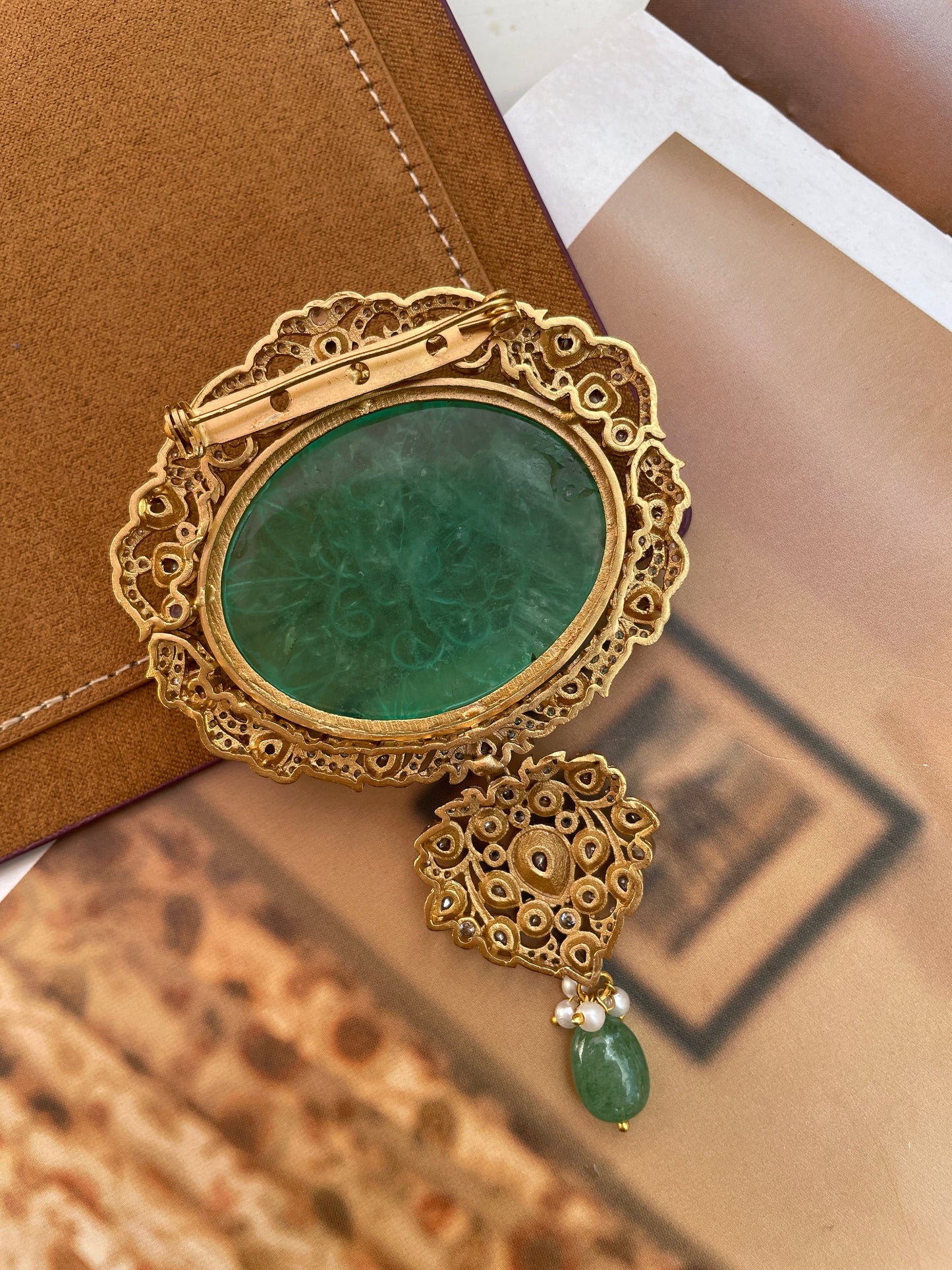 Indraneel Carved Emerald Brooch