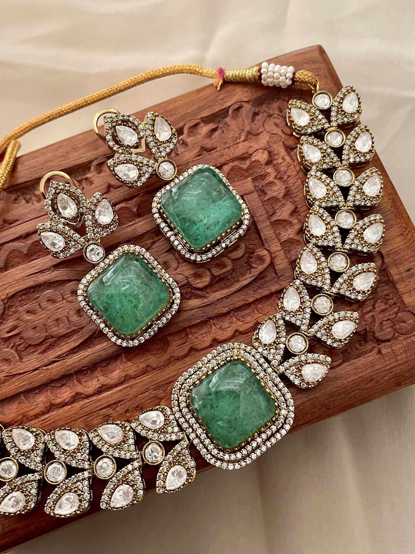 Neelima Moissanite Polki and Emerald Choker Set
